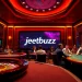 Experience the excitement of jeetbuzz casino with vibrant gameplay at poker tables and roulette.