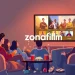 Enjoying a movie night with friends on zonafilm, showcasing a cozy living room and vibrant film selection.